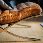 a modern leather chair recovered in a two tone leather finish genuine leather